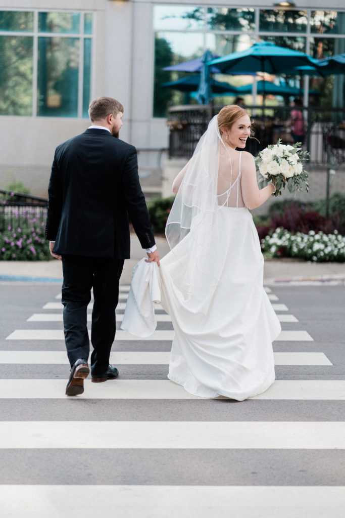 huntsville wedding photographer couple walking after ceremony 